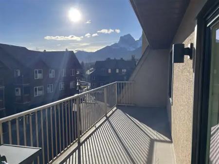 Gorgeous Mountain Views from Sun-Drenched Balcony | 220 - 200 Three Sisters Drive, Canmore