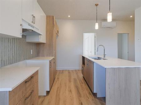 5 1/2 condo locatif neuf