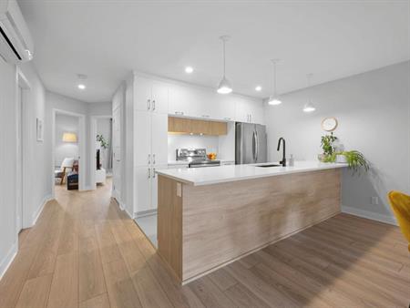 Magnifique condo avec 2 chambres et un bureau