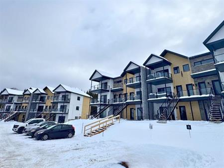 5 1/2 condo locatif neuf