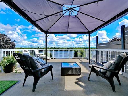 Maison en rangé à louer aux abords de la rivière des Prairies à Laval