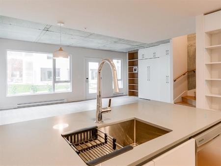 Magnifique maison de ville 4 1/2