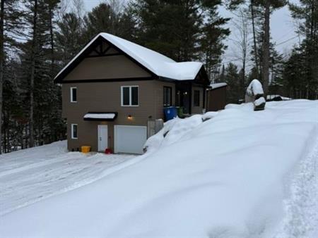 3 1/2 AVEC GARAGE REZ-DE-JARDINS SAINTE-SOPHIE (BORD DE L'EAU)