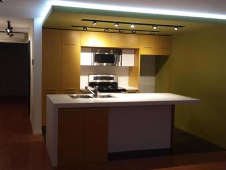 Logement 3 1/2 dans Triplex Moderne