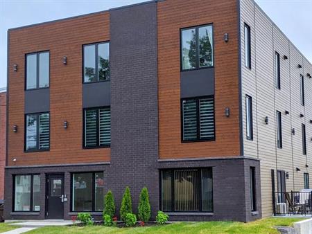 5 1/2 1880$ construction récente