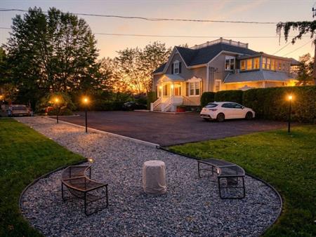 Vue fleuve 180° — Unité de prestige avec solarium, immense patio et terrain