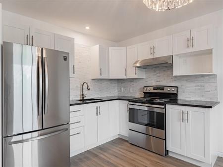 3 1/2 semi-meublé près centre d'achat et autoroute 20