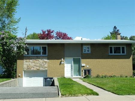 4-bed 2-bath house for rent in V sector of Brossard
