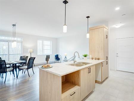 Condo locatif moderne 2 chambres – Plafonds 9 pieds et ascenseur!