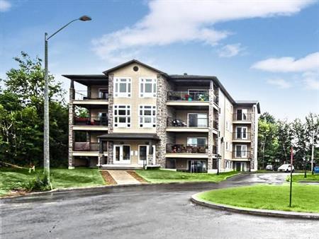 VOTRE REFUGE MODERNE | Grand 4½ Rez-de-Jardin à Val-Bélair